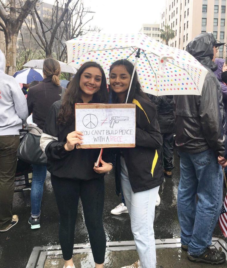 Anusha Kuchibhotla (left) attends the March for Our Lives event in San Jose.