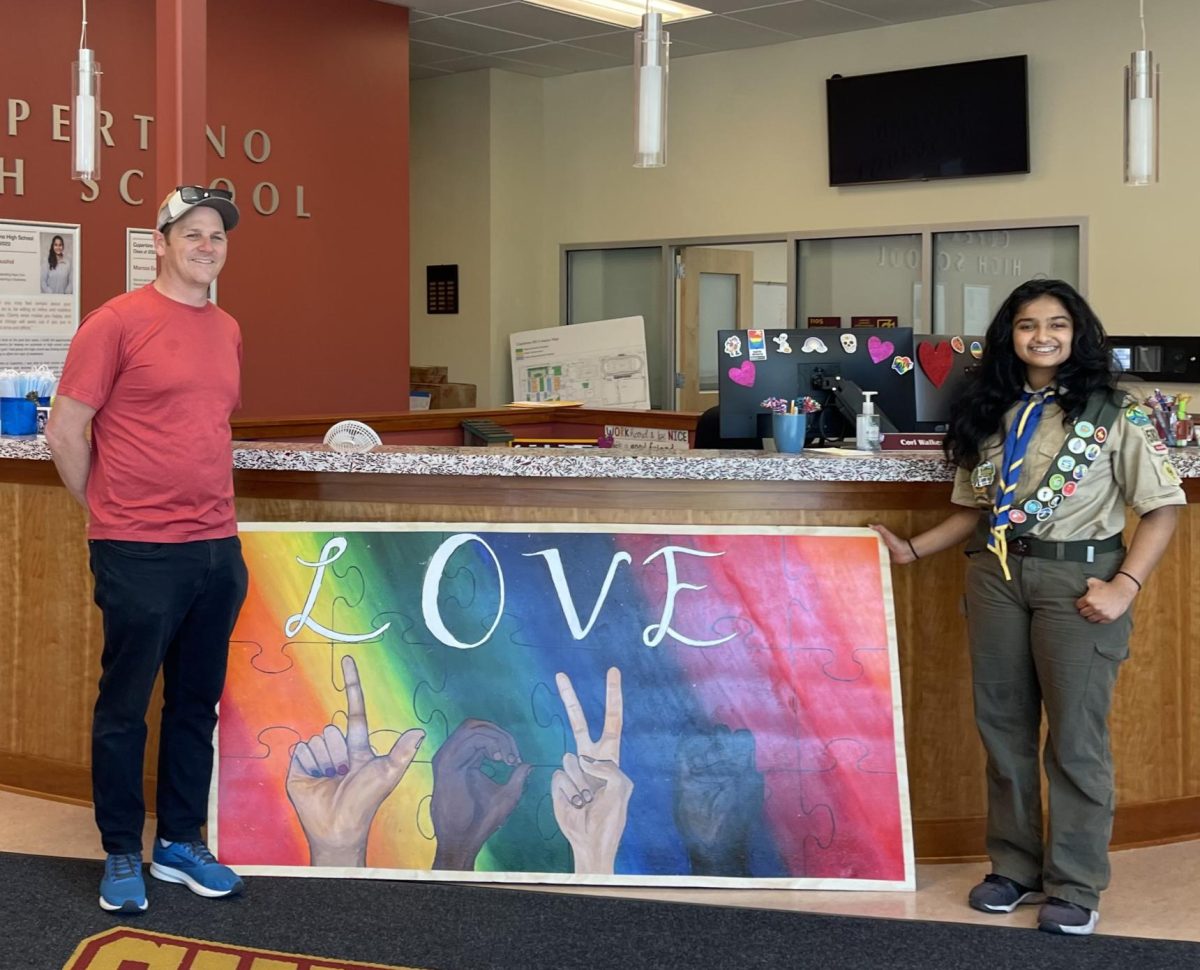 Upasana Puraniks LOVE mural brightens up Room 214 at Tinos Wellness Center. Her work on this Eagle Scout service project spreads positivity in the school.
